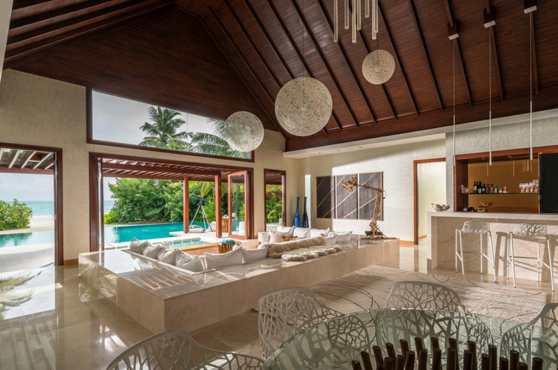 Living room of a Three Bedroom Beach Pool Pavilion at Niyama Private Islands