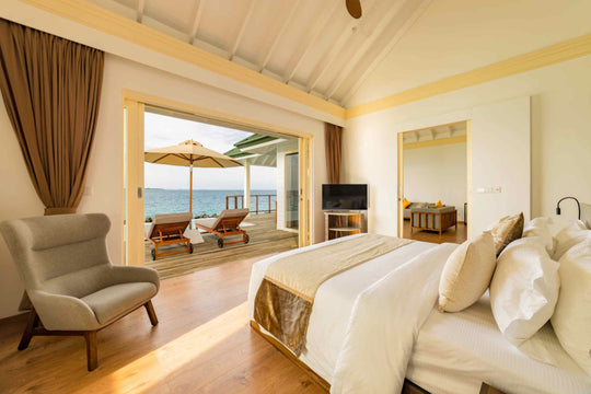 Bedroom of a Water Pavilion with Pool and Slide at Siyam World, Noonu Atoll, Maldives