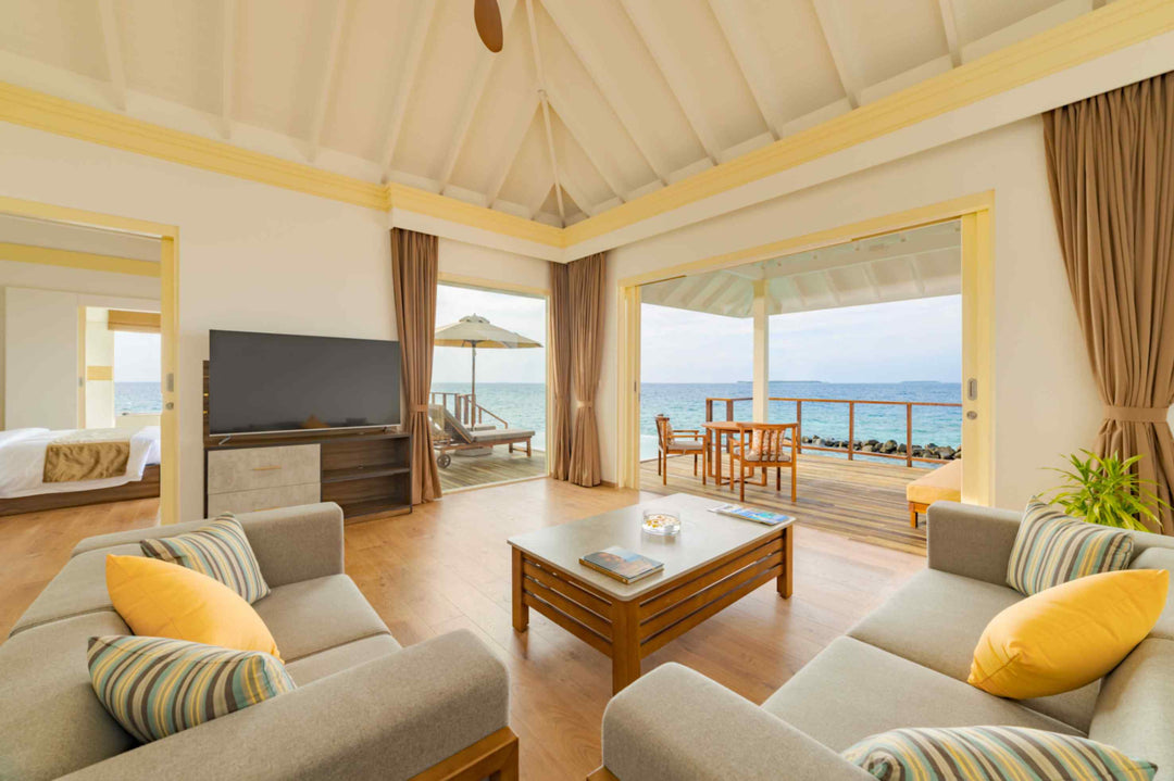 Living room of a Water Pavilion with Pool and Slide at Siyam World, Noonu Atoll, Maldives