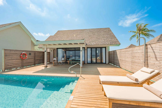 Water Pool Villa at ananea Madivaru Maldives, overwater deck with a private pool level with the lagoon
