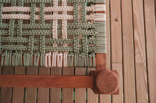 A woven wall hanging and timber panelling in a villa at ananea Madivaru Maldives