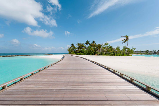 The jetty at ananea Madivaru Maldives running out over the lagoon towards the island