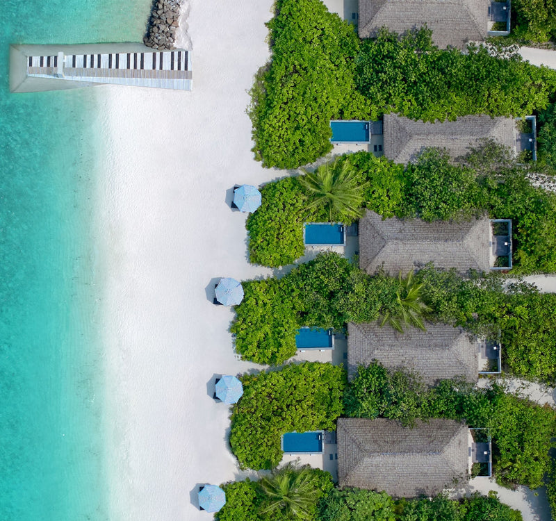 A Beach Villa with Pool at Le Méridien Maldives Resort & Spa seen from the air