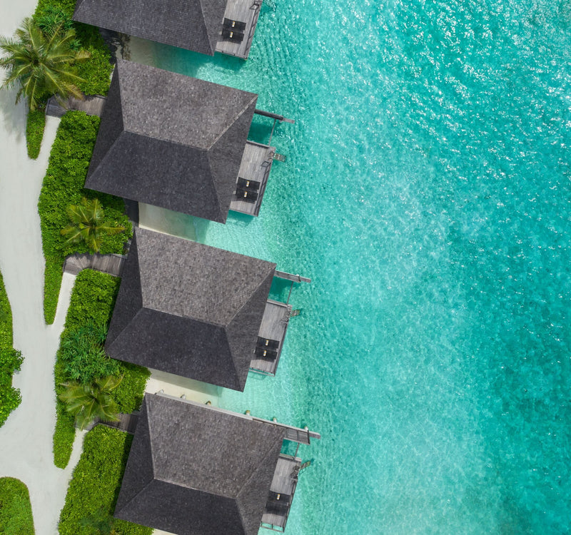 Lagoon Villas at Le Méridien Maldives Resort & Spa, each with a private terrace and ocean access