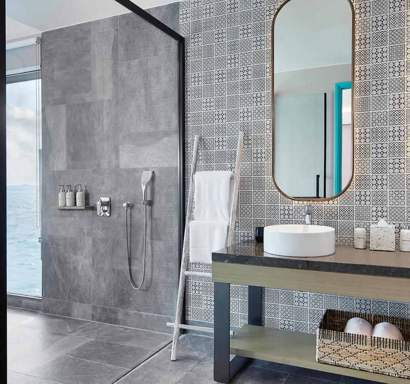 The bathroom of a Sunrise Overwater Villa at Le Méridien Maldives Resort & Spa