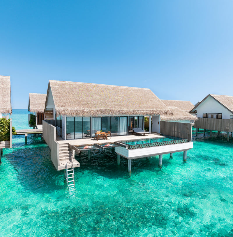 The exterior of a One-Bedroom Overwater Suite with Pool at Hilton Maldives Amingiri Resort & Spa.