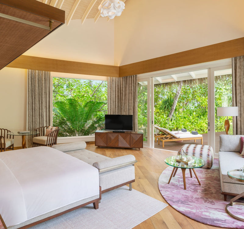The bedroom of a Beach Pool Villa Sunrise at JW Marriott Maldives Resort & Spa