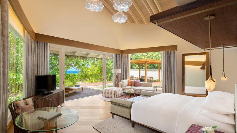 The bedroom of a Beach Pool Villa Sunset at JW Marriott Maldives Resort & Spa