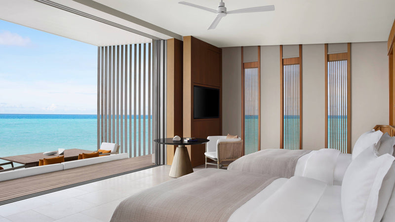 The twin bedroom of a Two-Bedroom Water Villa at The Ritz-Carlton Maldives, Fari Islands