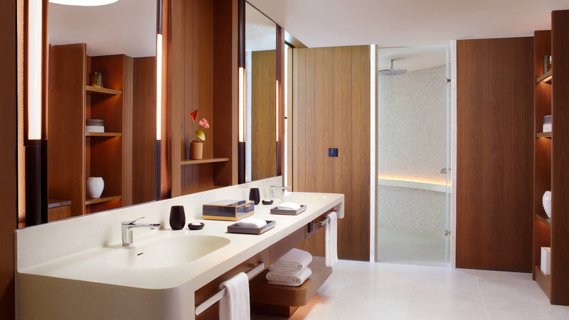 A villa bathroom at The Ritz-Carlton Maldives, Fari Islands, with a tub and a shower
