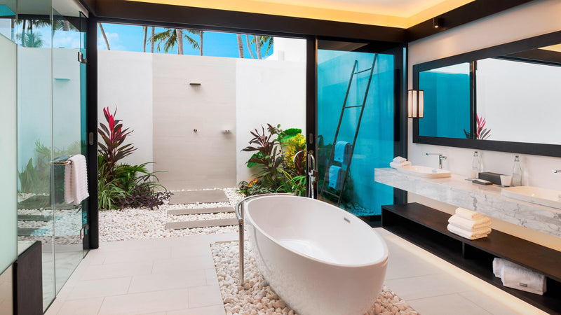 The bathroom of a Beach Villa with Pool at The Westin Maldives Miriandhoo Resort