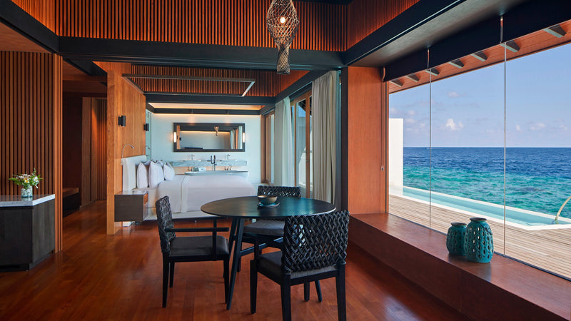The living area of an Overwater Villa with Pool at The Westin Maldives Miriandhoo Resort
