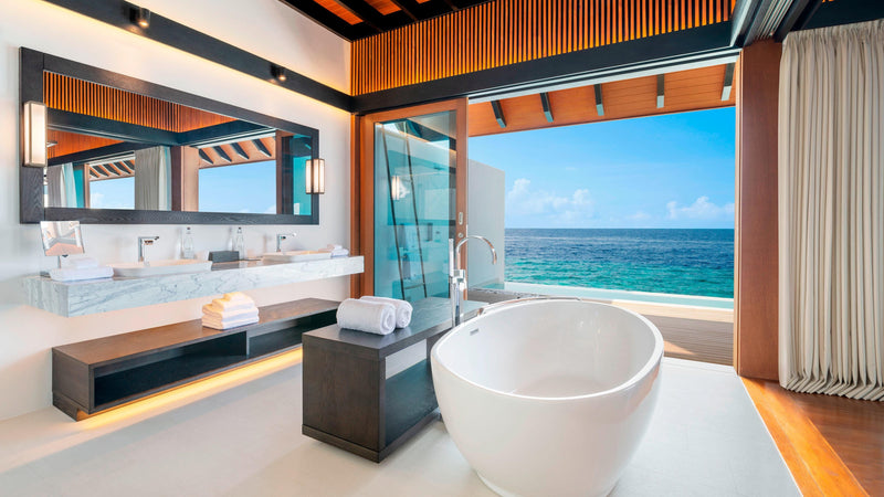 The bathroom of an Overwater Villa with Pool at The Westin Maldives Miriandhoo Resort