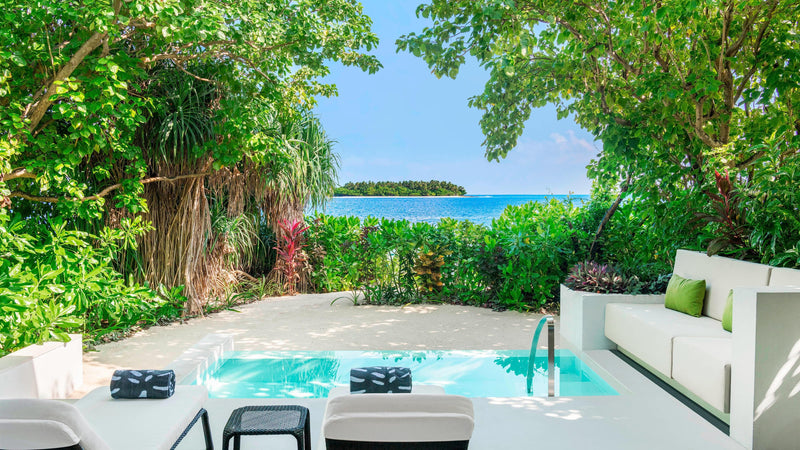 The deck of a Beach Villa with Pool at The Westin Maldives Miriandhoo Resort
