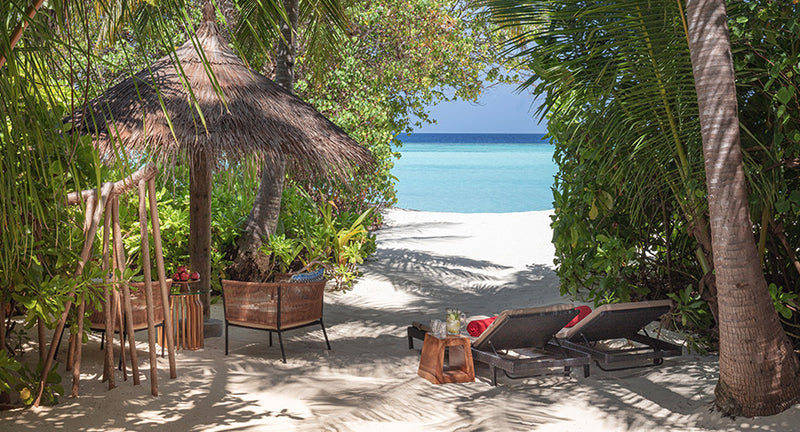 A beach villa at NH Collection Maldives Havodda Resort.