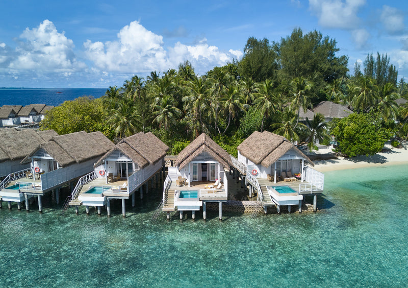 The exterior of a One Bedroom Over Water Pool Villa at NH Maldives Kuda Rah Resort.