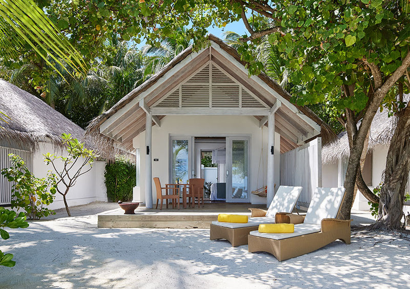 A One Bedroom Beach Pool Villa at NH Maldives Kuda Rah Resort.