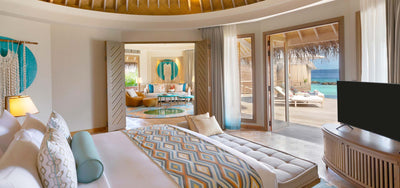 Another view of the bedroom of an Ocean House with Private Pool at The Nautilus Maldives.