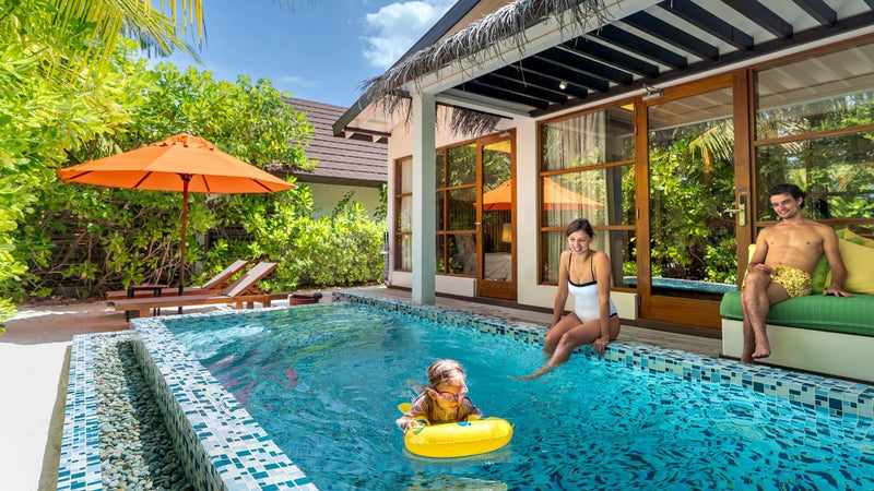 OBLU SELECT Sangeli, North Malé Atoll: a family in the private pool of a beach pool villa