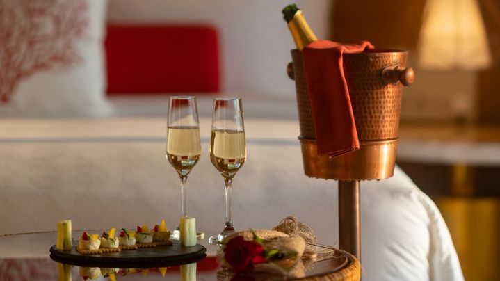 OBLU SELECT Lobigili, North Malé Atoll: champagne and sweets laid out in a villa