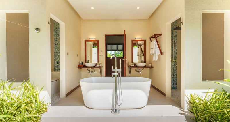 VARU by Atmosphere, North Malé Atoll: a villa bathroom with a freestanding bath