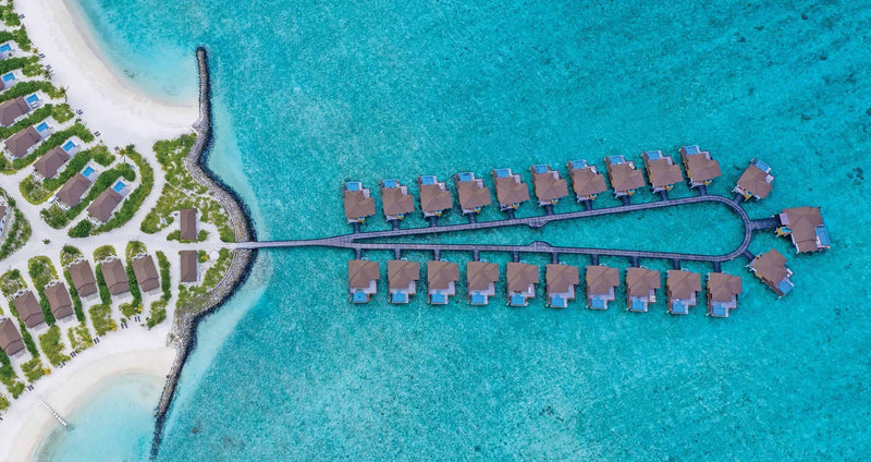 VARU by Atmosphere, North Malé Atoll: from above, the loop of water villas off the beach