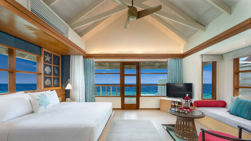 OBLU SELECT Lobigili, North Malé Atoll: a SunNest Water Pool Villa bedroom with sea views