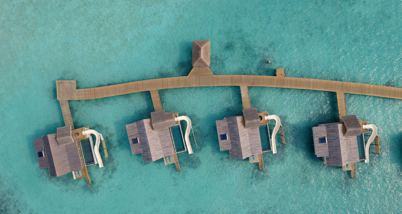 The deck of an overwater villa at RAH GILI Maldives.