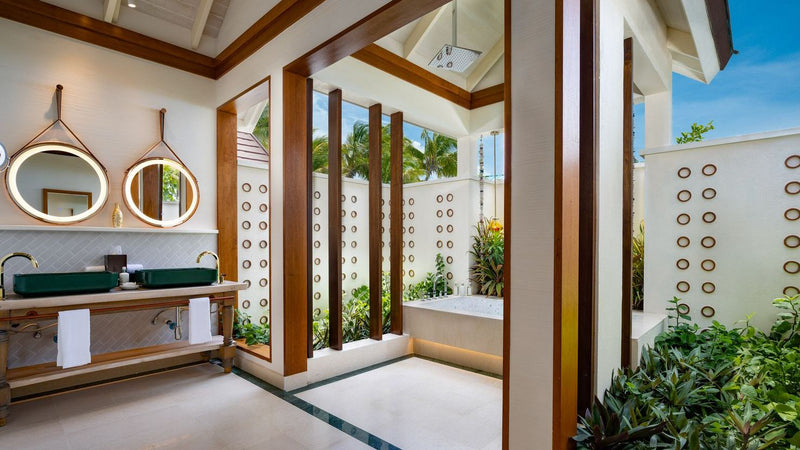 OBLU SELECT Lobigili, North Malé Atoll: a SunNest Beach Pool Villa bathroom opening onto a garden