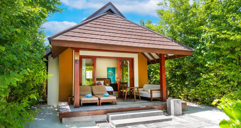 VARU by Atmosphere, North Malé Atoll: a beach villa among the trees, its terrace facing the sand