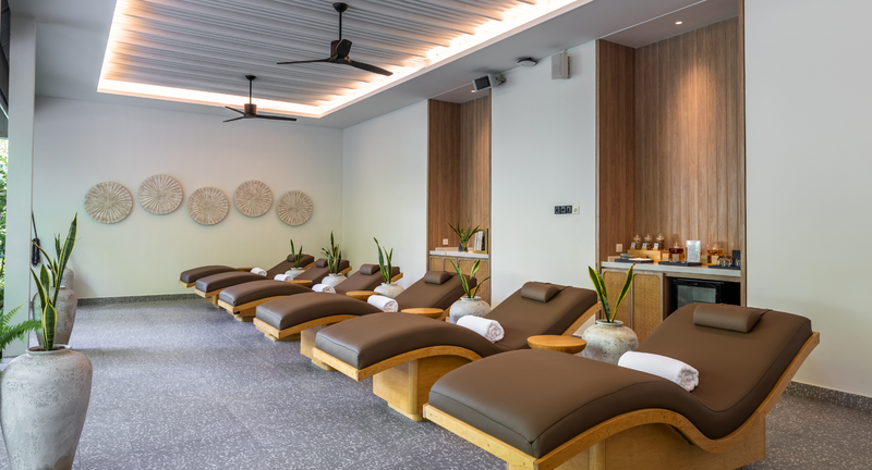 A row of loungers in the AvaniSpa relaxation area at Avani+ Fares Maldives.