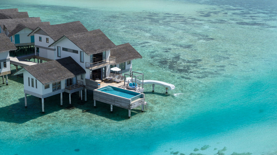 The Two Bedroom Lagoon Pool Villa with Slide at Cora Cora Maldives from the air