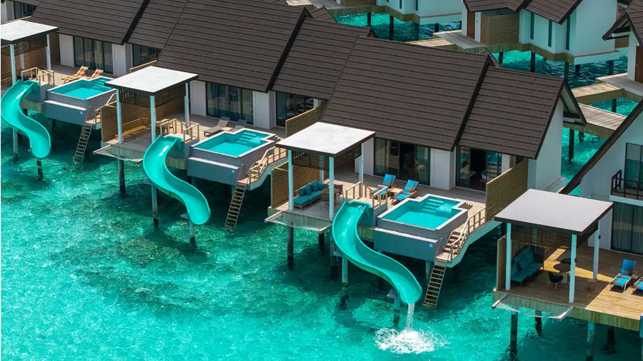 A Water Pool Villa with Slide at Meyyafushi Maldives