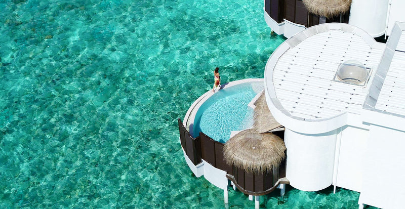 OBLU SELECT Sangeli, North Malé Atoll: from above, a round overwater villa with its own pool