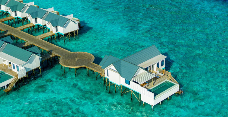 OBLU NATURE Helengeli by SENTIDO, North Malé Atoll: from above, the jetty and the larger water suite at its end