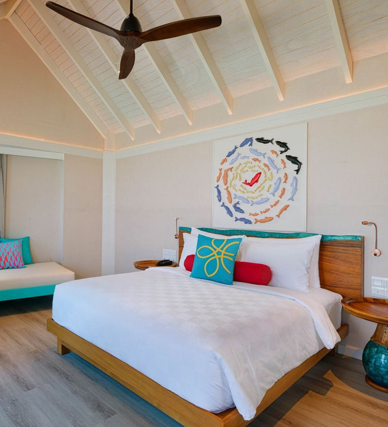 OBLU NATURE Helengeli by SENTIDO, North Malé Atoll: a villa bedroom with a painted fish mural above the bed