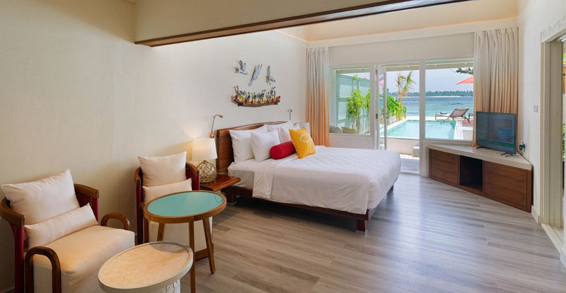 OBLU NATURE Helengeli by SENTIDO, North Malé Atoll: a villa bedroom opening onto a private pool, the sea beyond