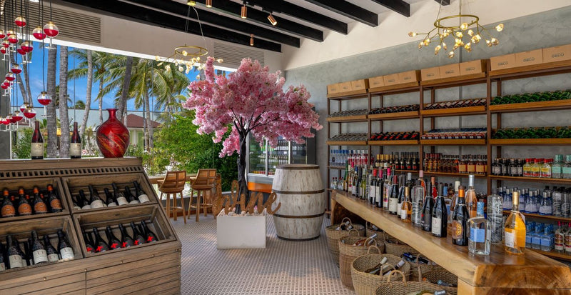 OBLU Xperience Ailafushi, North Malé Atoll: shelves of wine and spirits in the wine boutique