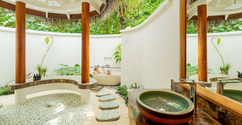 OBLU SELECT Sangeli, North Malé Atoll: an open-air garden bathroom with a stone bath and twin basins