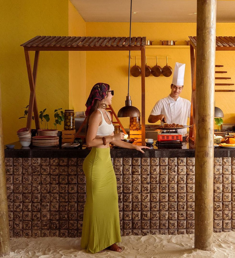 OBLU SELECT Lobigili, North Malé Atoll: a chef at a cooking station