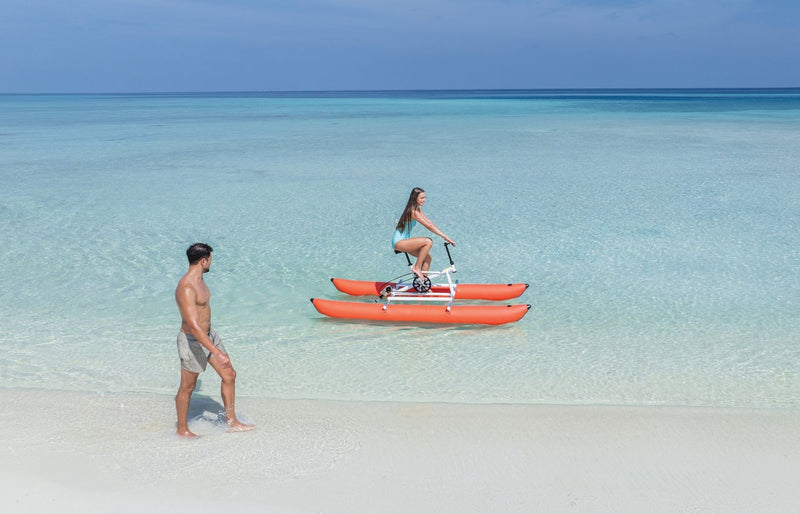 VARU by Atmosphere, North Malé Atoll: a guest riding a water bike in the lagoon