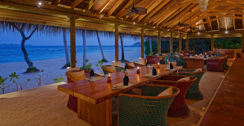 OBLU NATURE Helengeli by SENTIDO, North Malé Atoll: a beachfront restaurant under a thatched roof