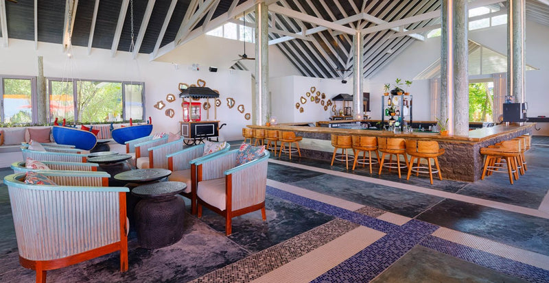 OBLU NATURE Helengeli by SENTIDO, North Malé Atoll: the main bar, with lounge chairs and a long counter