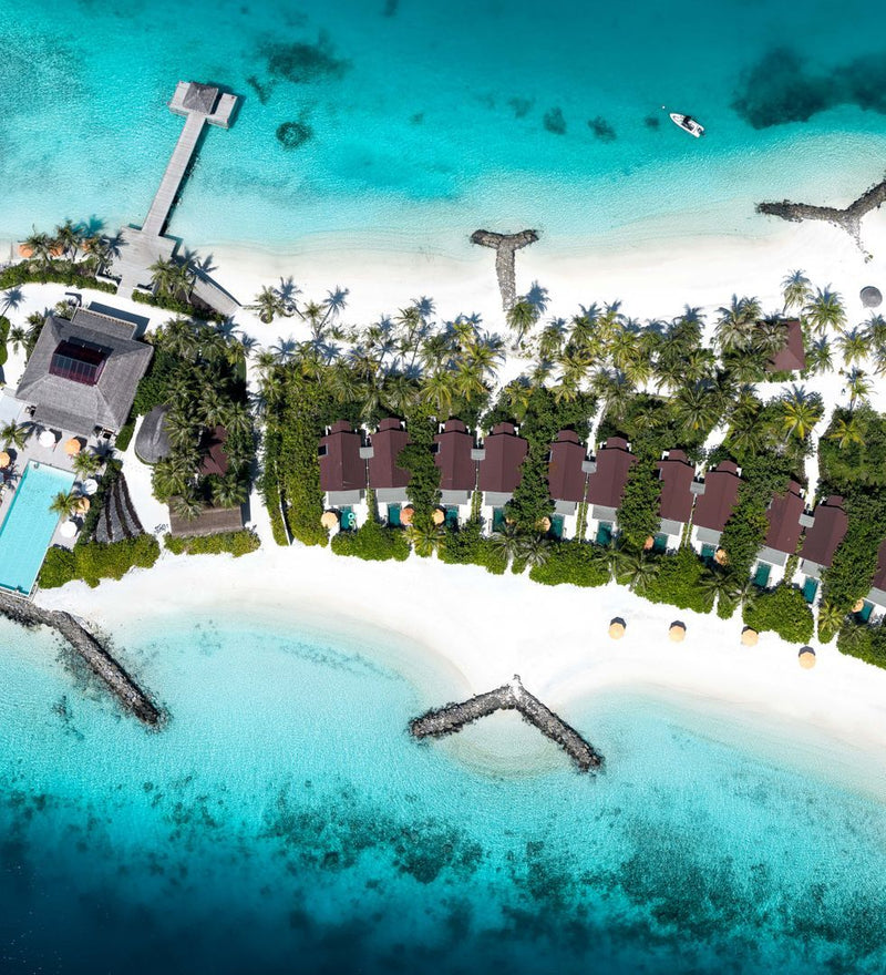 OBLU SELECT Lobigili, North Malé Atoll: beach villas along the shore, seen from directly above