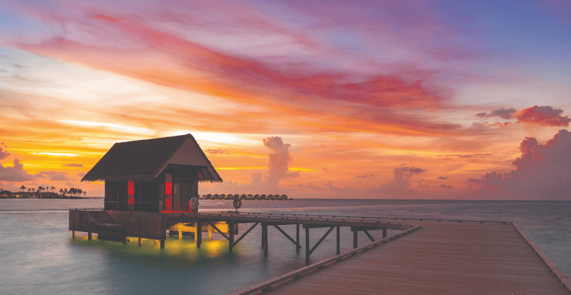 OBLU Xperience Ailafushi, North Malé Atoll: an overwater pavilion at sunset