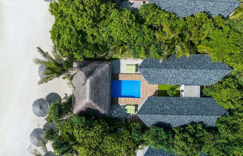 RAAYA by Atmosphere, Raa Atoll: from above, a two-bedroom beach villa with its pool between the roofs