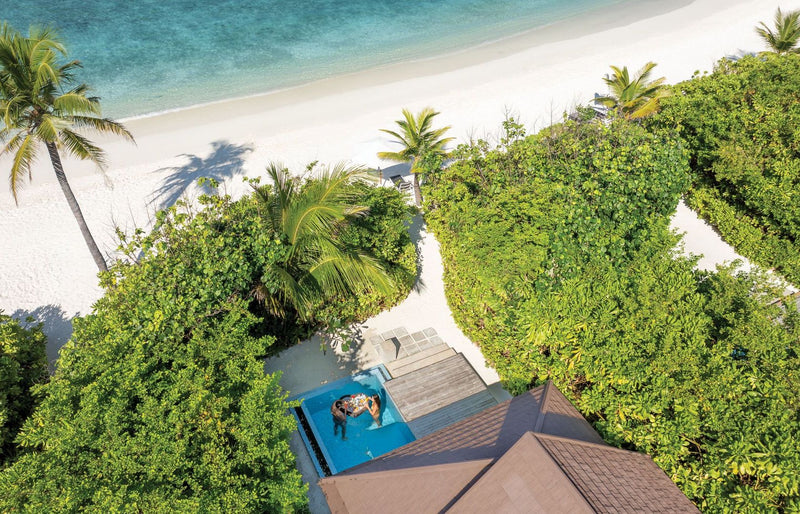 VARU by Atmosphere, North Malé Atoll: from above, a beach pool villa behind the sand