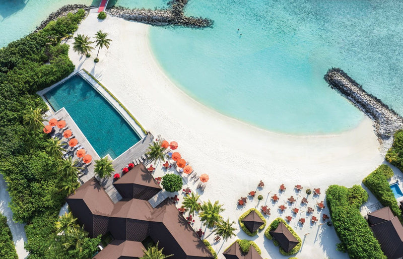 VARU by Atmosphere, North Malé Atoll: from above, the main pool, the beach and the breakwater