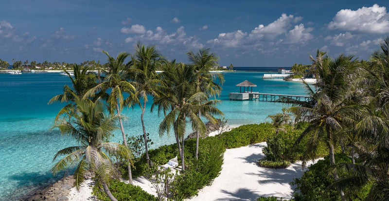 OBLU SELECT Lobigili, North Malé Atoll: a sandy path through the palms to the beach