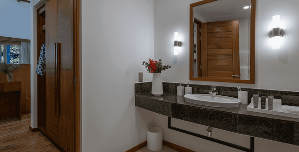 The bathroom of a Sunset Beach Suite at Ifuru Island Maldives.